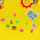 A collection of small, colorful plastic toys in a clear pouch.