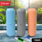 Three capsule travel toothbrush cases in vibrant blue, pink, and green colors.