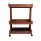 Close-up of the durable plastic shelves on the serving trolley.