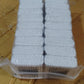 Detailed view of a bamboo cotton swab's pure cotton tip.