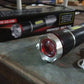 Detailed view of the multi-tool LED flashlight's zoomable light feature.