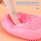Two silicone body scrubbers, pink and blue, demonstrating color options.