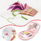 Interior view of the portable sewing kit showing neatly organized needles and scissors.