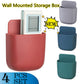 White wall mounted phone holder with a mobile phone charging.