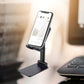 PHOBIA desktop mobile holder supporting a tablet for comfortable use.