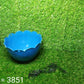Durable hanging flower pot with drainage hole, suitable for outdoor use.