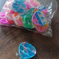Bright background showcasing the playful nature of mini fidget keychains.