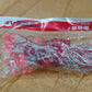 Stretch of 10 meter LED decorative string fairy lights glowing red in evening