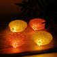 Close-up of lotus canopy LED decorative lamp with bright warm light effect