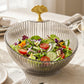 Fruit bowl with gold accent enhancing dining decor with fresh fruits