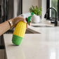 Decorative corn-shaped spray bottle used for watering indoor plants.