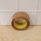 Brown packing tape being used for sealing boxes