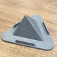 Close-up of Black Pyramid Mobile Stand illustrating premium ABS material