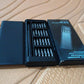 BoltForce 24-in-1 precision screwdriver set with its components and the sleek carrying case.