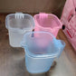 Stylish Transparent Bath Mug displayed in a modern bathroom setting.