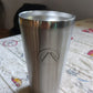 Versatile travel mug displayed in a dynamic outdoor setting, ready for adventure.