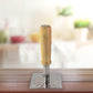 Square stainless steel plateau of ergonomic wooden handle potato masher