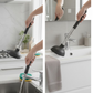 Illustration showing the powerful suction of the drain unblocker pump clearing a pipe.