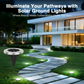 Outdoor solar powered LED lights installed along garden pathways and lawn areas