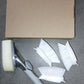 Versatile kitchen scrub brush cleaning tool with a convenient dispenser.