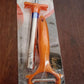 Packaging for the CookAura Gas Lighter Peeler Combo set.