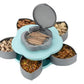 Smart candy box with a rotating lid, demonstrating easy access to snacks.