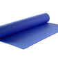 Yoga mat rolled up with carry strap and bag, ready for transport.