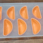 Silicone fruit ice tray displayed in a modern kitchen.