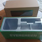 Modern desk organizer styled as a container with several storage compartments.