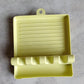 Easy-to-clean kitchen utensil rest, ideal for everyday cooking.