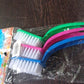 Multi-purpose kitchen cleaning brush set for everyday use.