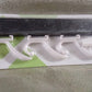Detail view of the durable metal hooks and wooden board of the GlimmerHome coat rack