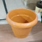 Close-up of the drainage holes on the bottom of the durable garden pot.