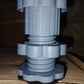 Washing machine lifted by Garth anti-skid pads, demonstrating enhanced stability and floor protection.