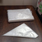Several pastries decorated beautifully using disposable piping bags
