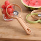 Fruit scooper and cutter tool displayed in kitchen setting