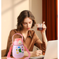 Stainless steel water bottle decorated with custom stickers for personalization