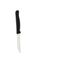 Demonstration of the kitchen knife's sharp stainless steel blade for effortless slicing.