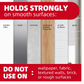 Adhesive screw hook with a clear sticky backing, demonstrating ease of wall mounting.