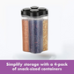 Transparent 4 compartment storage jar filled with grains and dry fruits.