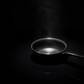 Diagram showcasing the thick induction-compatible bottom of the fry pan.