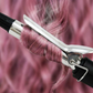 Side view of the hair curling iron, highlighting its sleek design.
