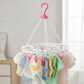 Close-up of the durable plastic clips on the multicolour drying stand.