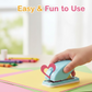 A yellow decorative hole puncher producing a heart shape for DIY crafts.