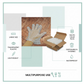 Hand wearing a clear plastic disposable glove while handling fresh food.