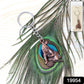 Close-up of detailed Bal Krishna crawling metal keychain