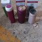 Group of assorted stainless steel insulated water bottles for travel
