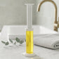 Toilet gel cleaner removing stains from toilet bowl surface