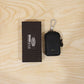 Car key holder in retail packaging display.