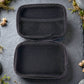Open empty travel storage case showing interior compartments